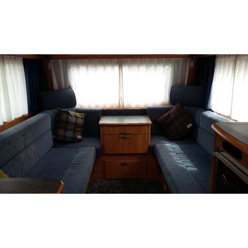 Hymer caravan 2004 model, 3 berth. In excellent condition and with many extras.
