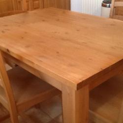 Pine kitchen/dining room table measuring 4' X 3'.