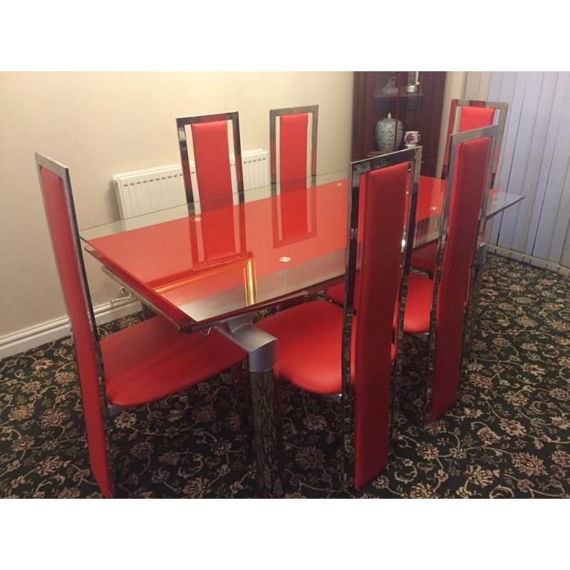 Extendable 8-seater glass dining table and chair set