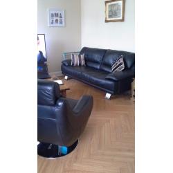 3 SEATER BLACK LEATHER SOFA & 2 LEATHER SWIVEL CHAIRS