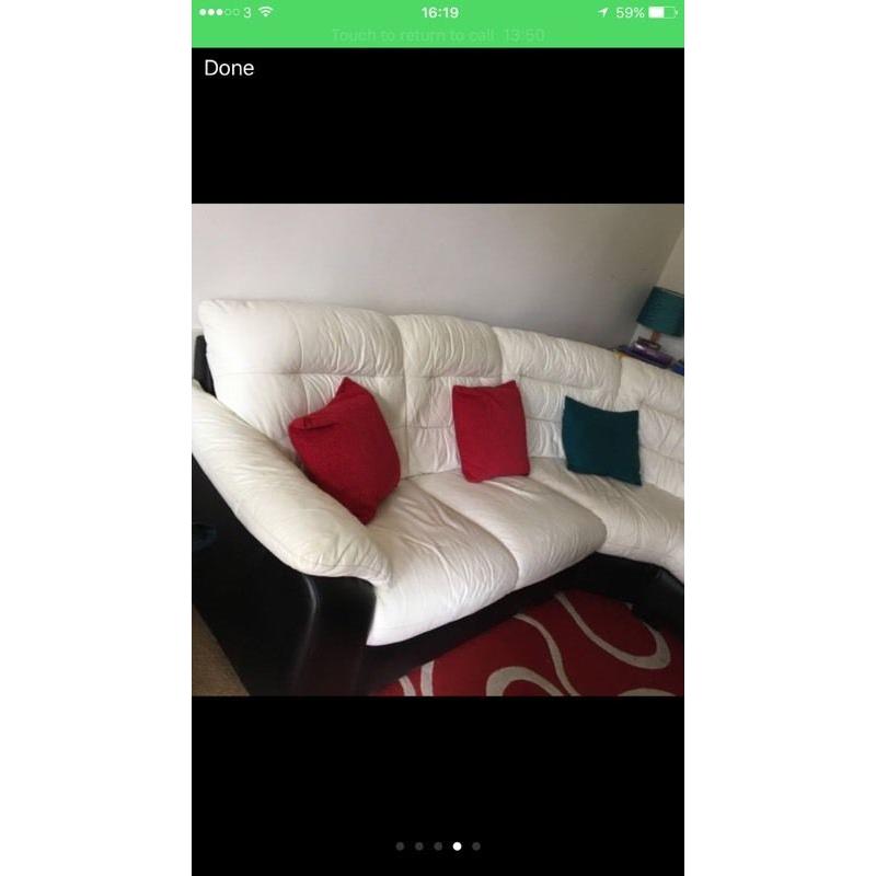 White leather sofa with electric recliner chair
