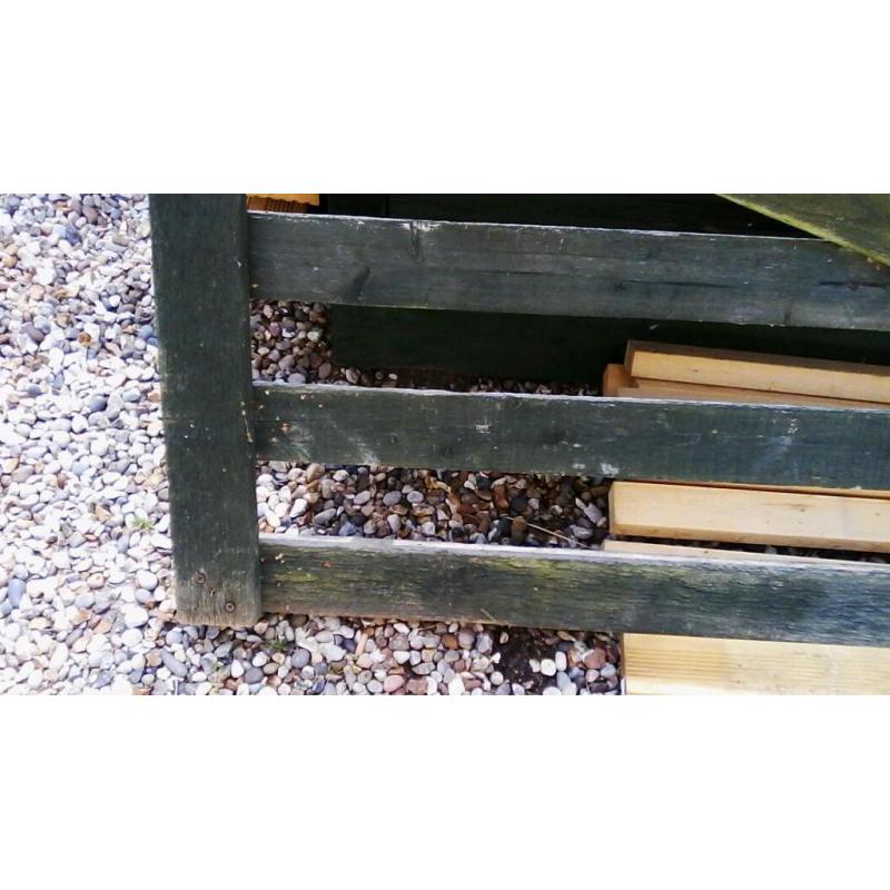 Long wooden gate roughly six ft