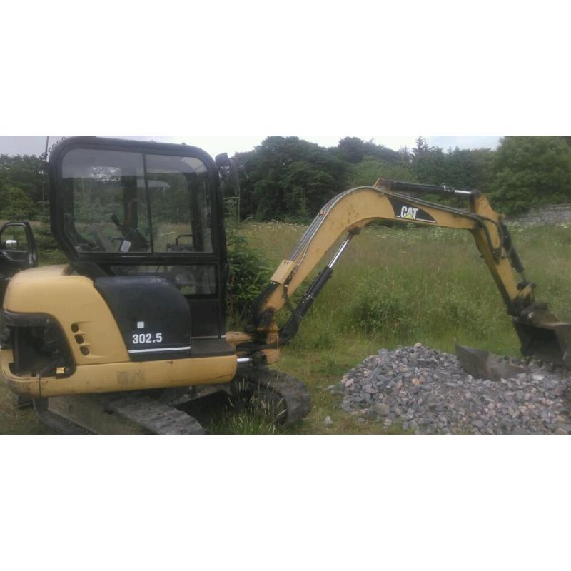 Cat 302.5 yr 1999 hitch 4 buckets