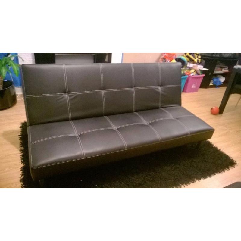 Black faux leather 3 point reclining sofa bed with chrome legs hardly used, Reclines to 3/4 bed.