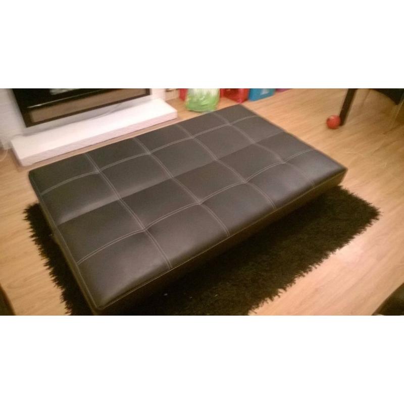 Black faux leather 3 point reclining sofa bed with chrome legs hardly used, Reclines to 3/4 bed.
