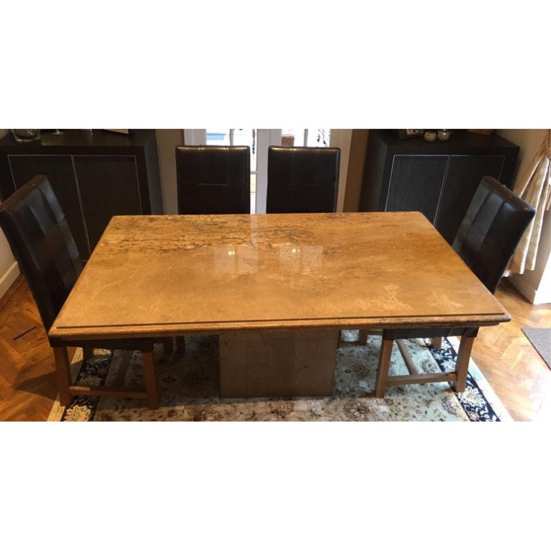 Stone dining table and six leather chairs