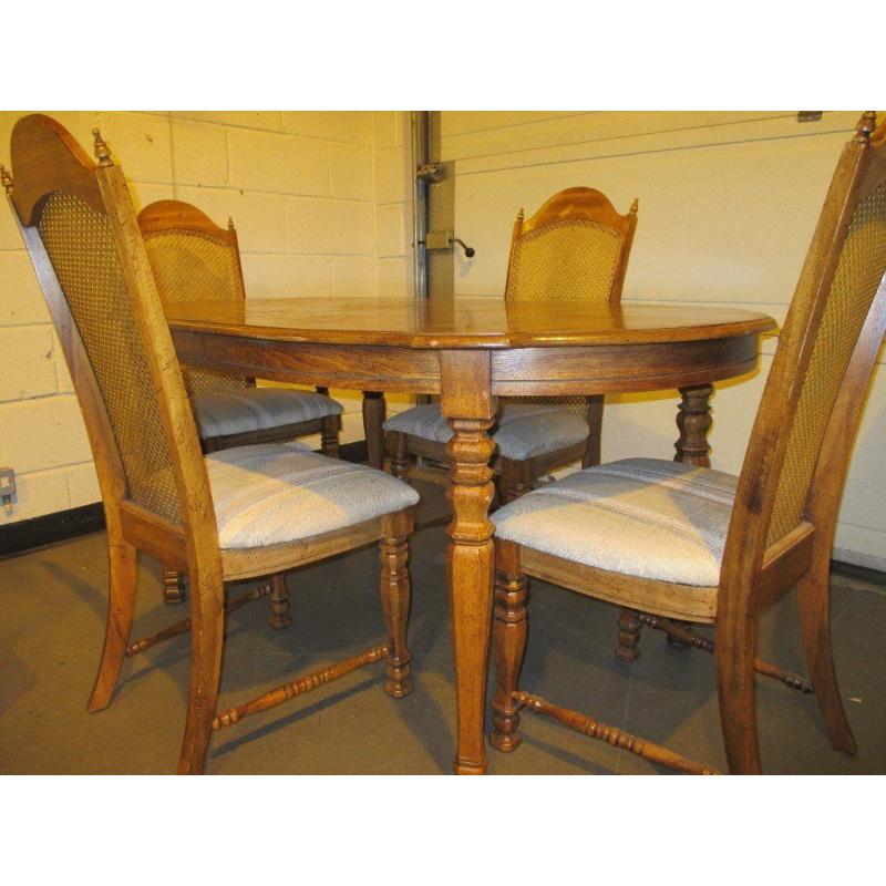 DINING TABLE WITH FOUR 4 MATCHING CANE BACKED DINING CHAIRS (ONE IS CARVER CHAIR) FREE DELIVERY