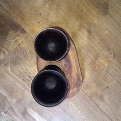 A pair of ebony wood African goblets