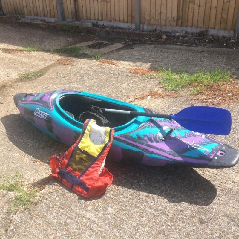 Kayak with skirt/paddle and buoyancy jacket. River or sea use.
