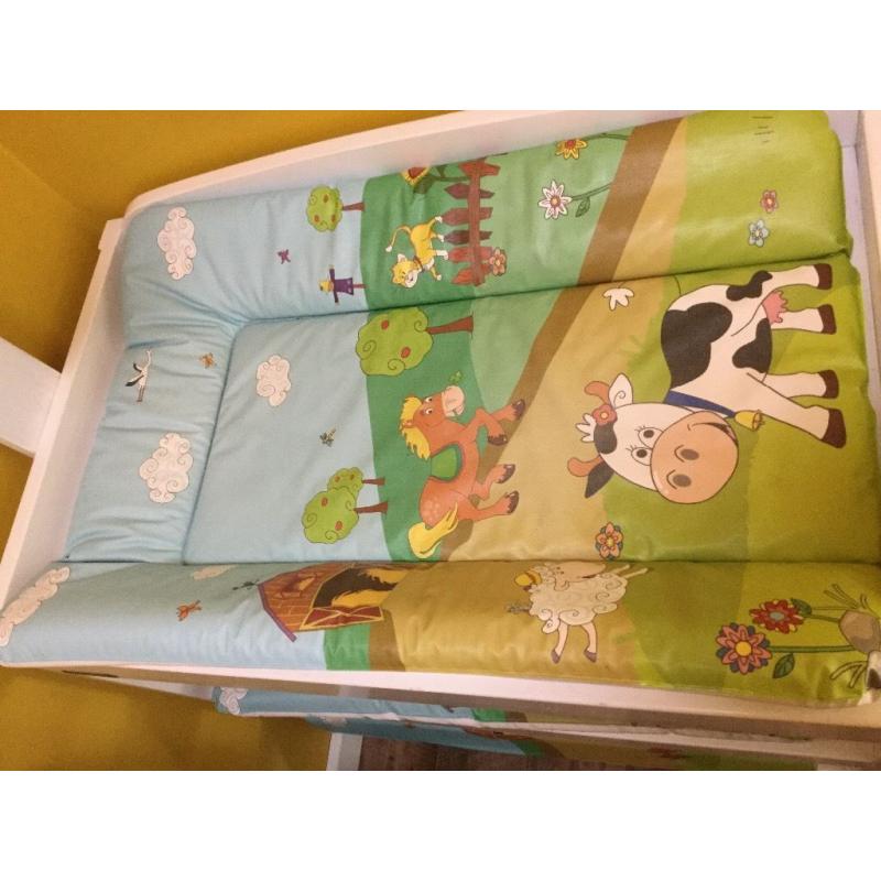 White wooden baby changer