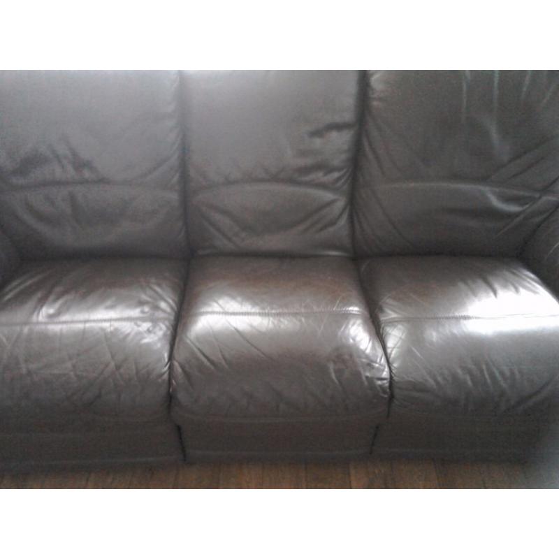 Three seater reclining brown leather sofa and armchair