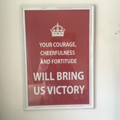Picture in distressed frame based on WW2 motivational posters