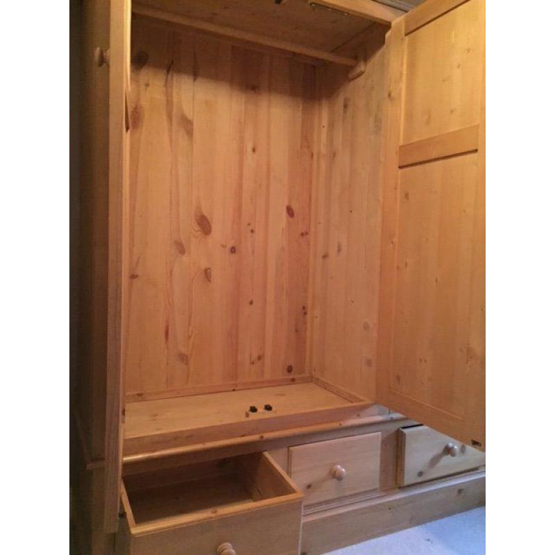 Triple Pine Wardrobe - Very good Condition. Full length hanging space and 3 deep drawers below.