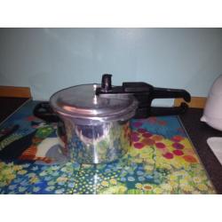 PRESSURE COOKER.