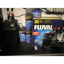 Fish tank with cabinet and external filter