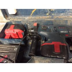 Bosch sds hammer drill two batteries works well and is a beast