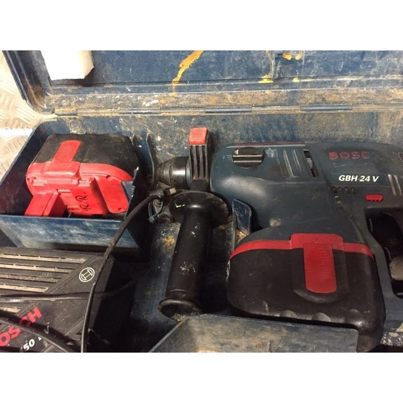 Bosch sds hammer drill two batteries works well and is a beast