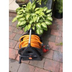 Garden hose on reel.