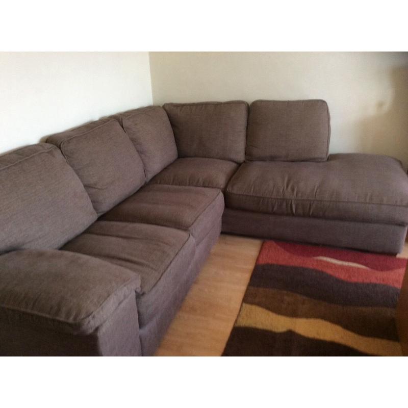 Large brown corner sofa