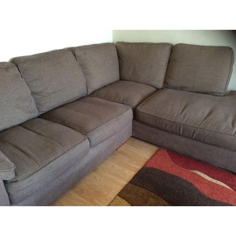Large brown corner sofa