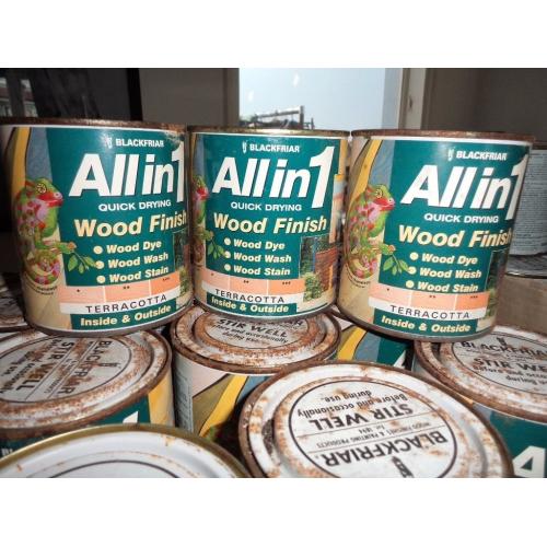 over 100 tins of wood paint for sale. 100