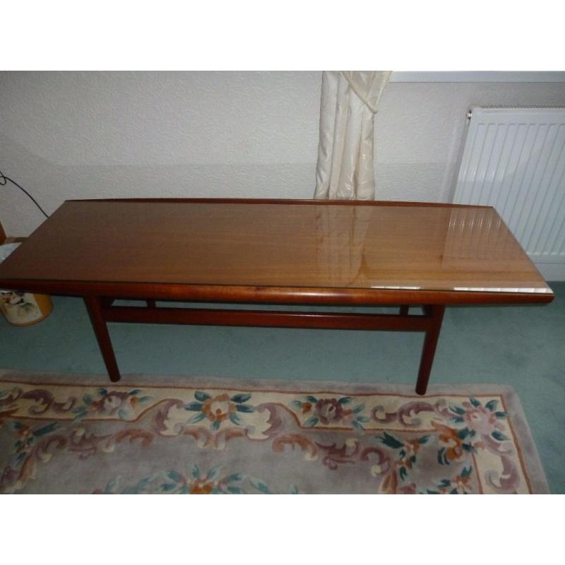 1960's long John table in teak, with glass top