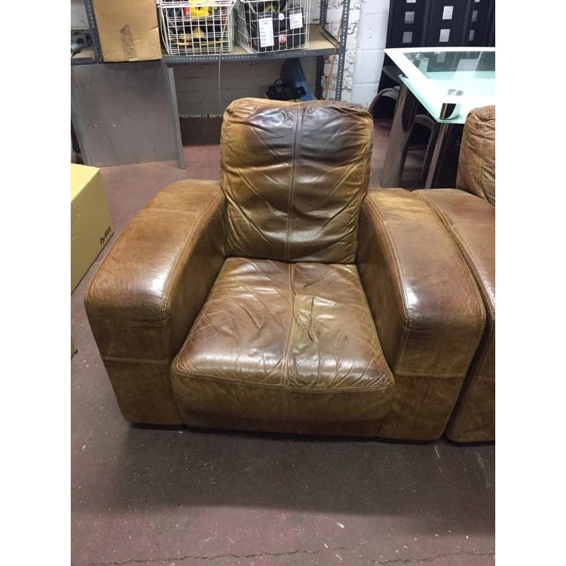 Brown leather sofa and chair