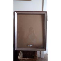 2 matching solid picture frames