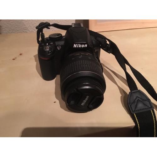 Nikon D3100 DSLR camera and 2 lenses
