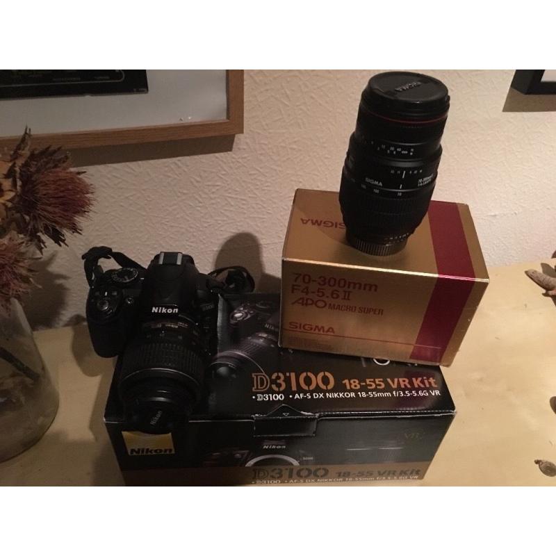Nikon D3100 DSLR camera and 2 lenses