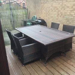 Rattan table and 4 chairs (genuine rattan) not cheap make