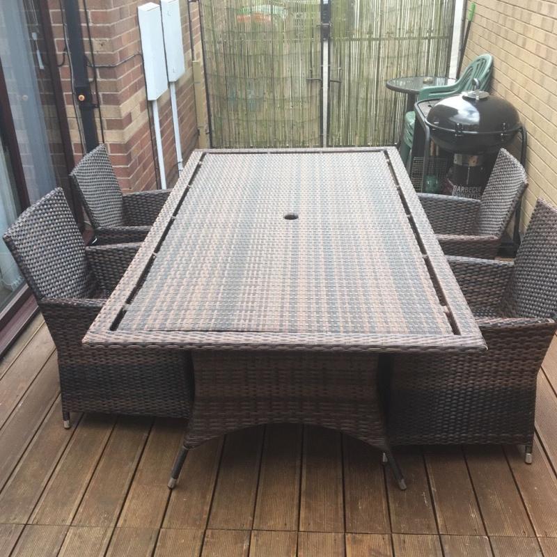Rattan table and 4 chairs (genuine rattan) not cheap make