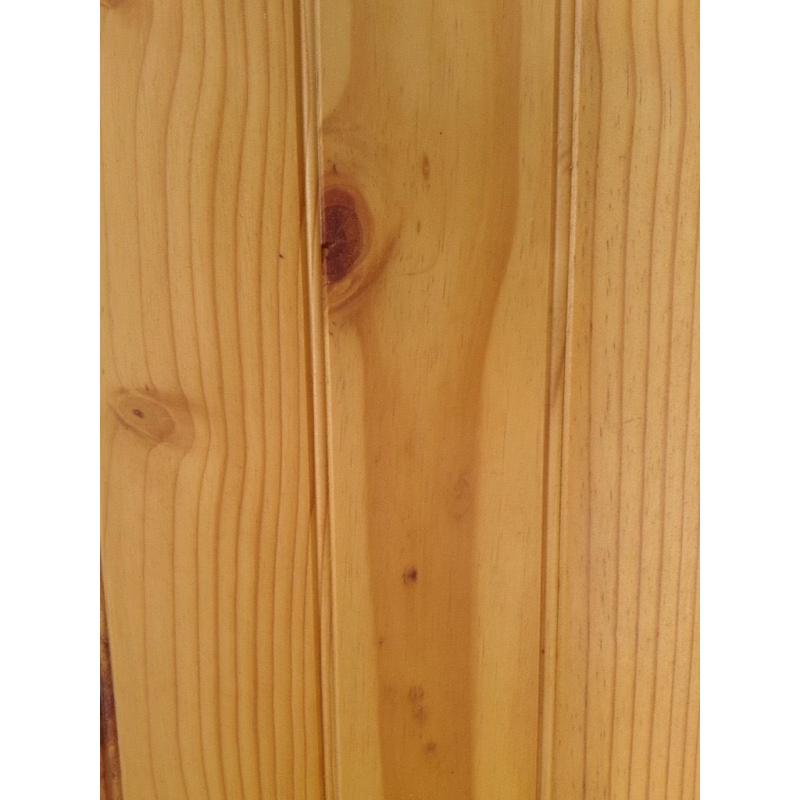 Two solid pine tongue and groove internal doors