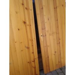 Two solid pine tongue and groove internal doors