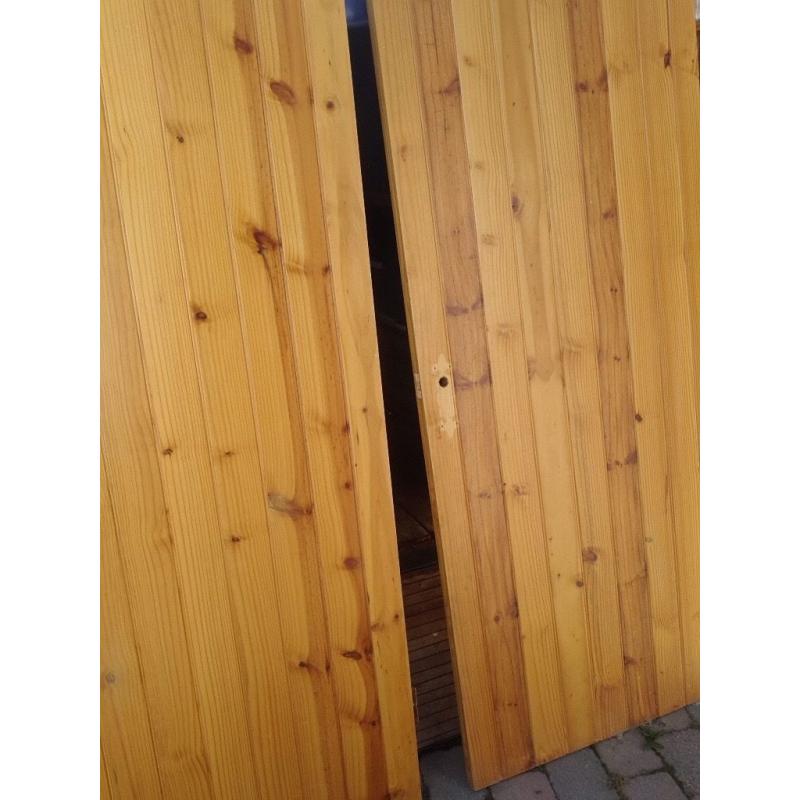 Two solid pine tongue and groove internal doors