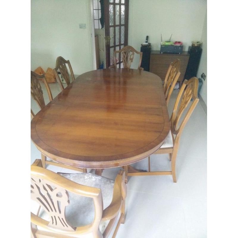 Wooden table with matching chairs