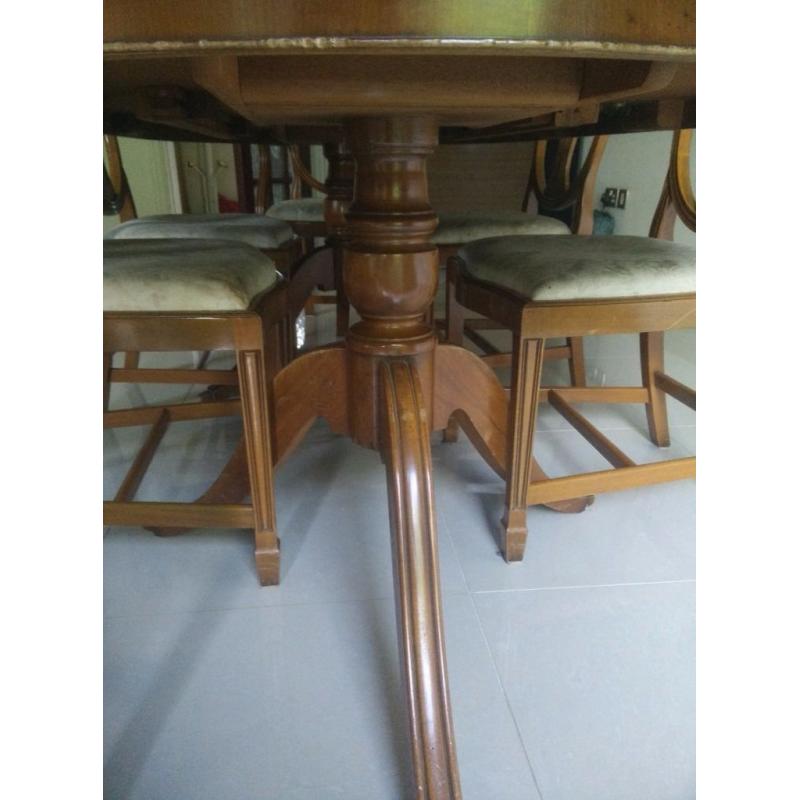 Wooden table with matching chairs