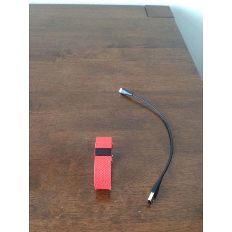 Tangerine small HR Fitbit nearly new