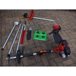 REALLY USEFUL GARDEN PETROL MULTI TOOL/ACCESSORIES AS NEW, USED ONLY ONCE