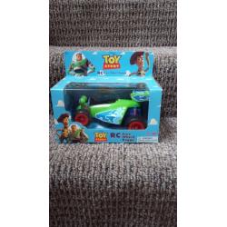 Toy Story RC free wheel buggy. ..STILL IN ORIGINAL BOX.