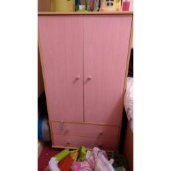 Pink kids wardrobe with two drawers