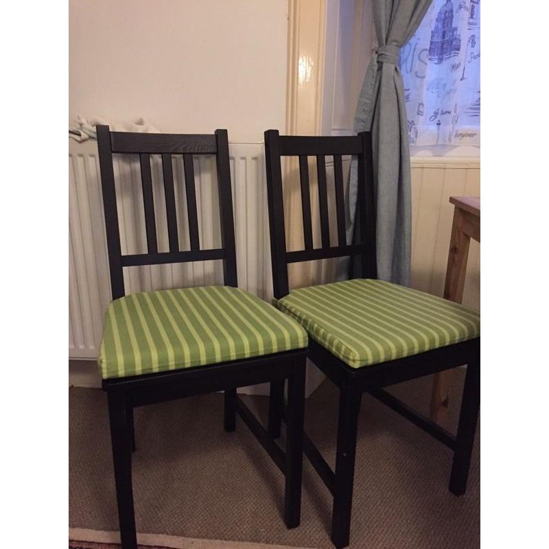 X4 black kitchen chairs.
