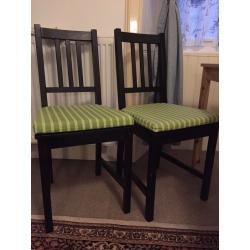 X4 black kitchen chairs.