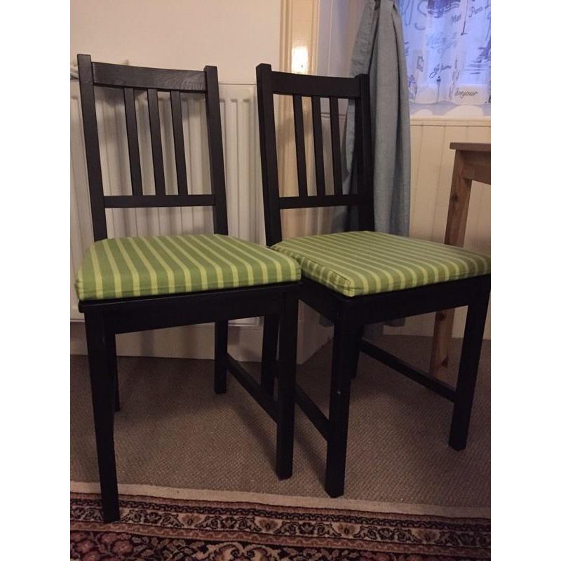 X4 black kitchen chairs.