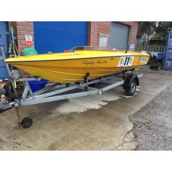 speed boat and trailer