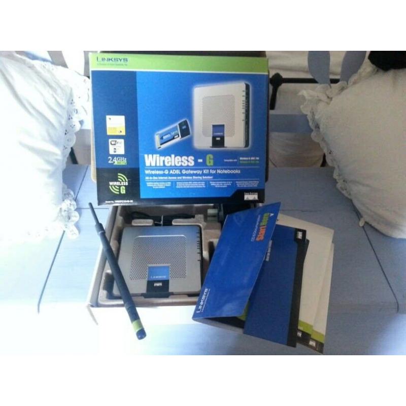 Linksys Wireless-G ADSL Modem (Model WGKPC354G-UK) with 7bDi High Gain Antenna