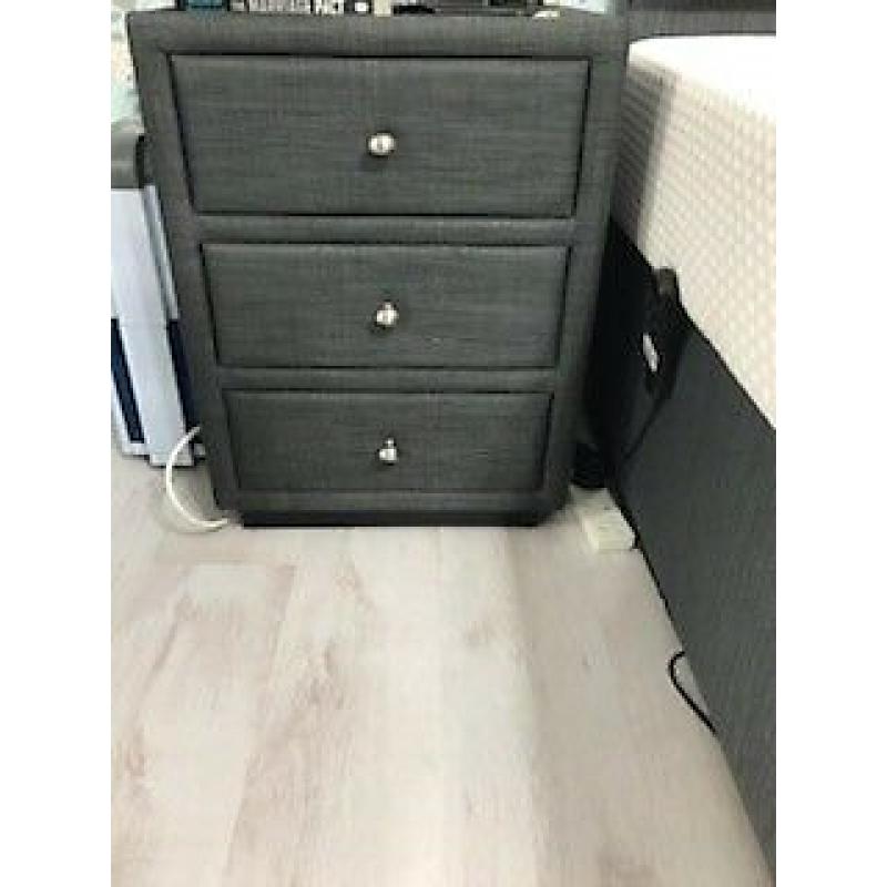 King size bed and two bed side units