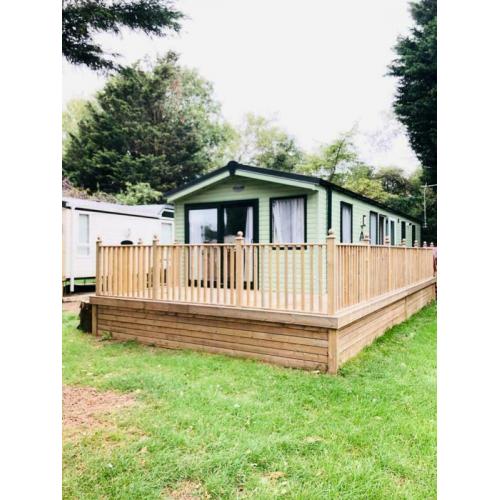 LUXURY HOLIDAY WITH WITH DECKING, PTIO DOORS AND FREE SITE FEES CALL 07955825040