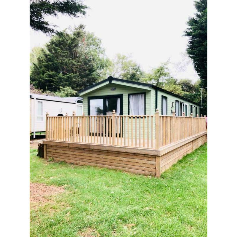 LUXURY HOLIDAY WITH WITH DECKING, PTIO DOORS AND FREE SITE FEES CALL 07955825040
