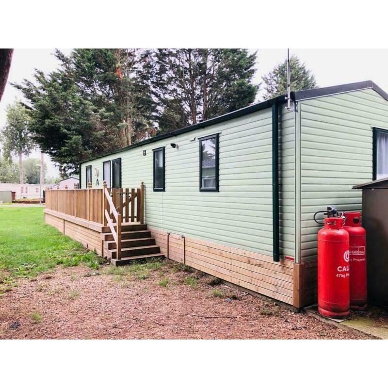 LUXURY HOLIDAY WITH WITH DECKING, PTIO DOORS AND FREE SITE FEES CALL 07955825040